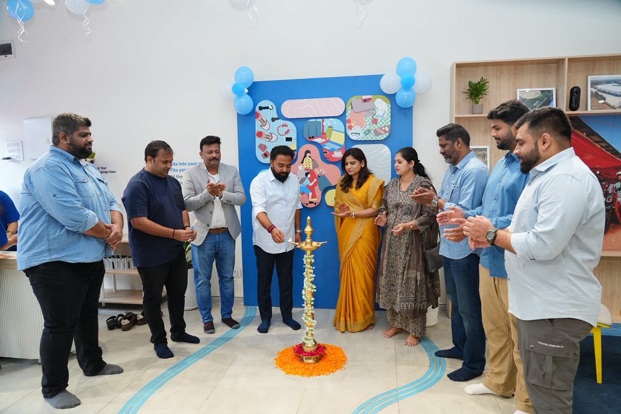 Rahul Awade lighting a ceremonial lamp at the opening of a new commercial premises in Ichalkaranji.